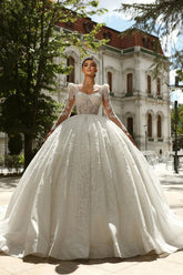 Elegant Long Sleeve Ball Gown Tulle Wedding Dress with Beads